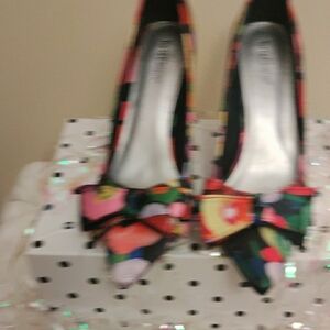 Red and Pink High Heels with Vibrant Bow